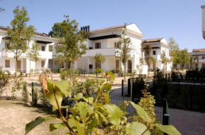 Luminous flat with attic in a residence with pool Bibione